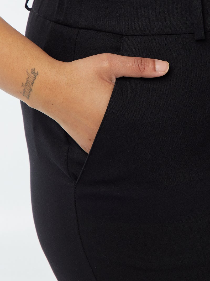 Halflange rok met split aan de voorzijde zwart - Kiabi