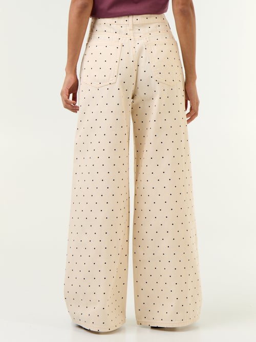 Jeans met wijde pijpen en stippen - Kiabi