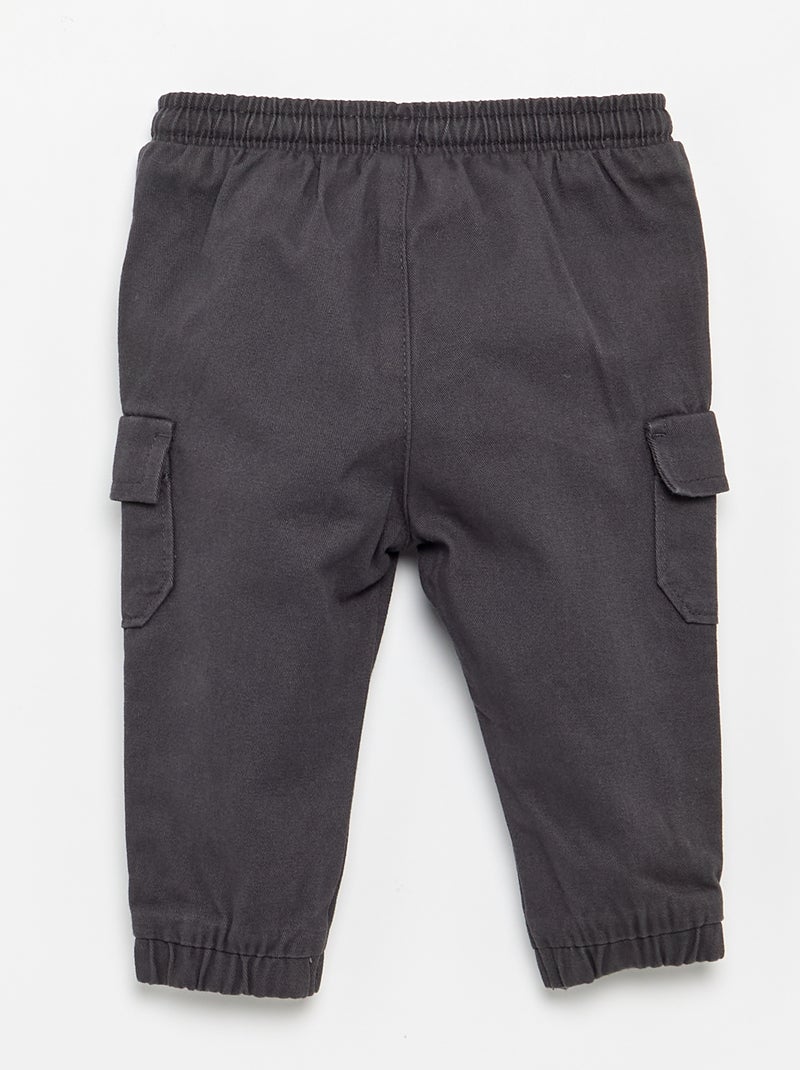 Jogg-broek van keperstof met zakken met klepje Zwart - Kiabi
