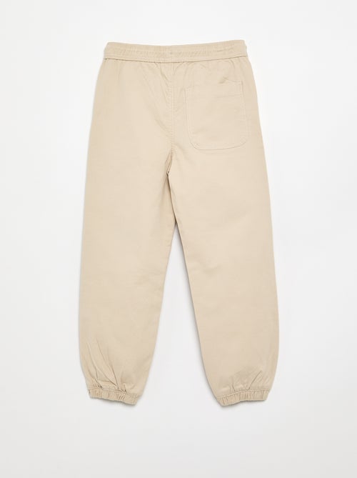Joggingbroek met trekkoordjes - Kiabi Joggingbroek met trekkoordjes - Kiabi