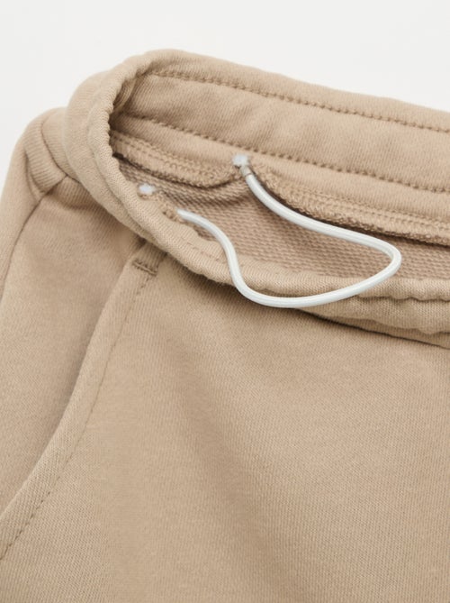 Joggingbroek van lichte molton met wijde pasvorm - gemakkelijk aan te trekken - Kiabi Joggingbroek van lichte molton met wijde pasvorm - gemakkelijk aan te trekken - Kiabi