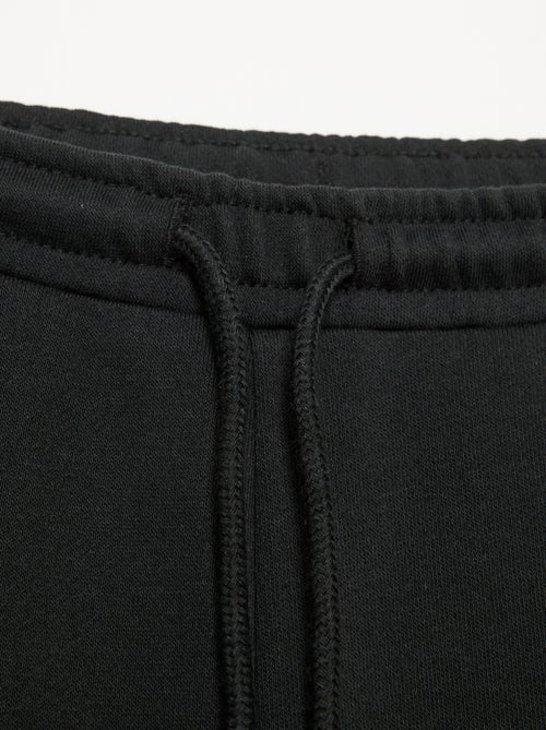 Joggingbroek van lichte molton met wijde pasvorm - gemakkelijk aan te trekken - Kiabi Joggingbroek van lichte molton met wijde pasvorm - gemakkelijk aan te trekken - Kiabi