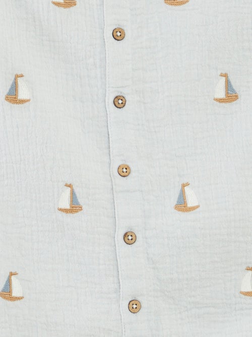 Kort speelpakje van zachte, luchtige katoen met leuke geborduurde details - Kiabi