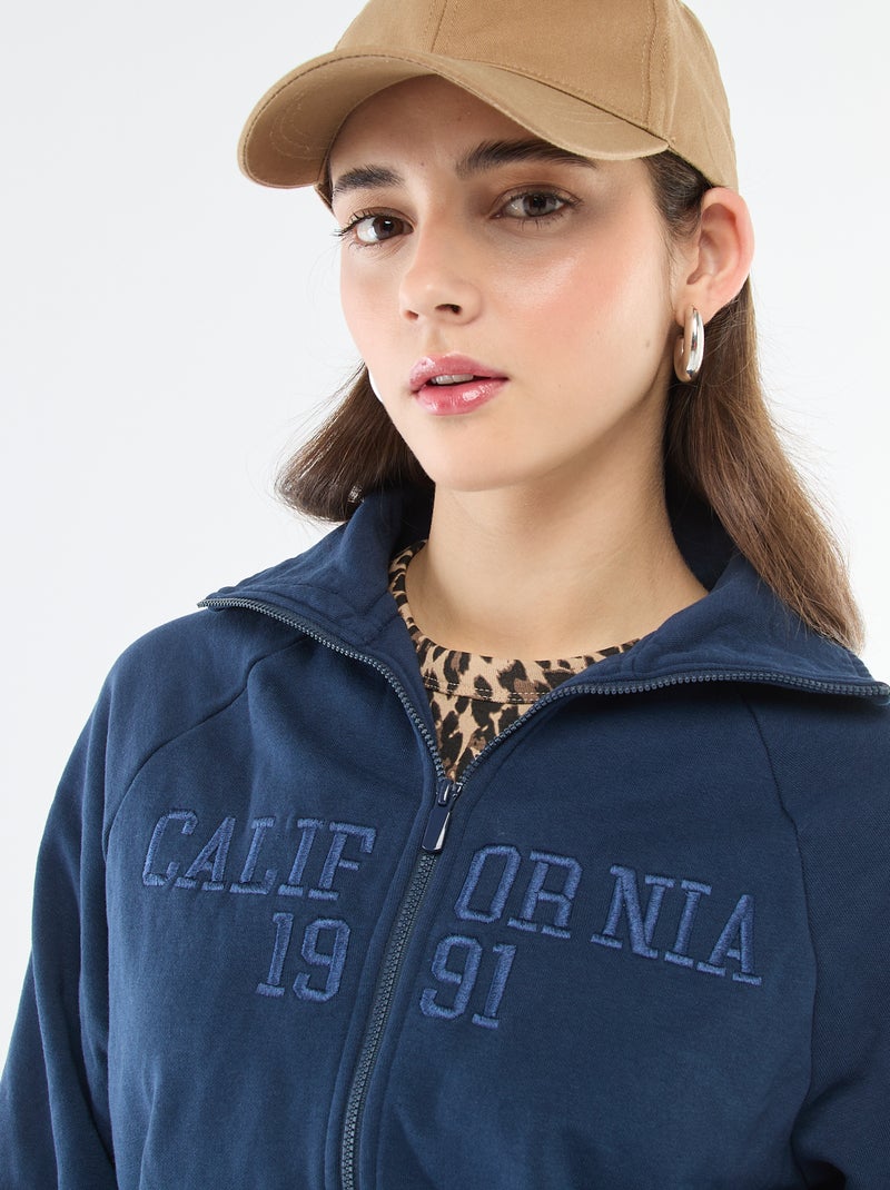 Kort sweatshirt met rits en geborduurde boodschap Blauw - Kiabi