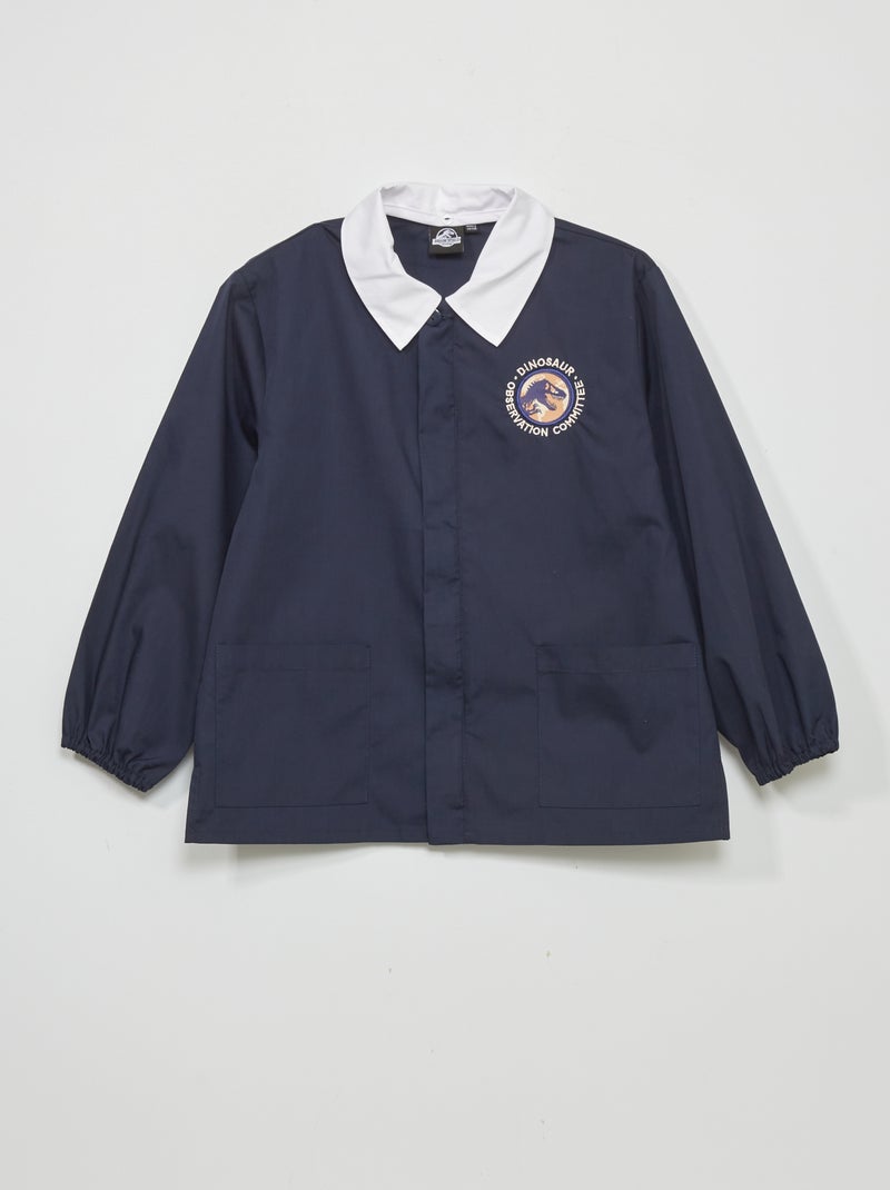 Korte schoolschort met dinosaurusembleem BLAUW - Kiabi
