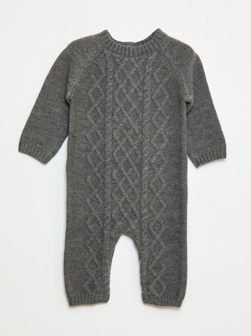 Lang, gebreid pakje met knopen op de rug - Kiabi