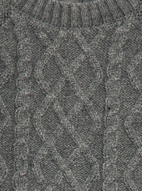 Lang, gebreid pakje met knopen op de rug - Kiabi