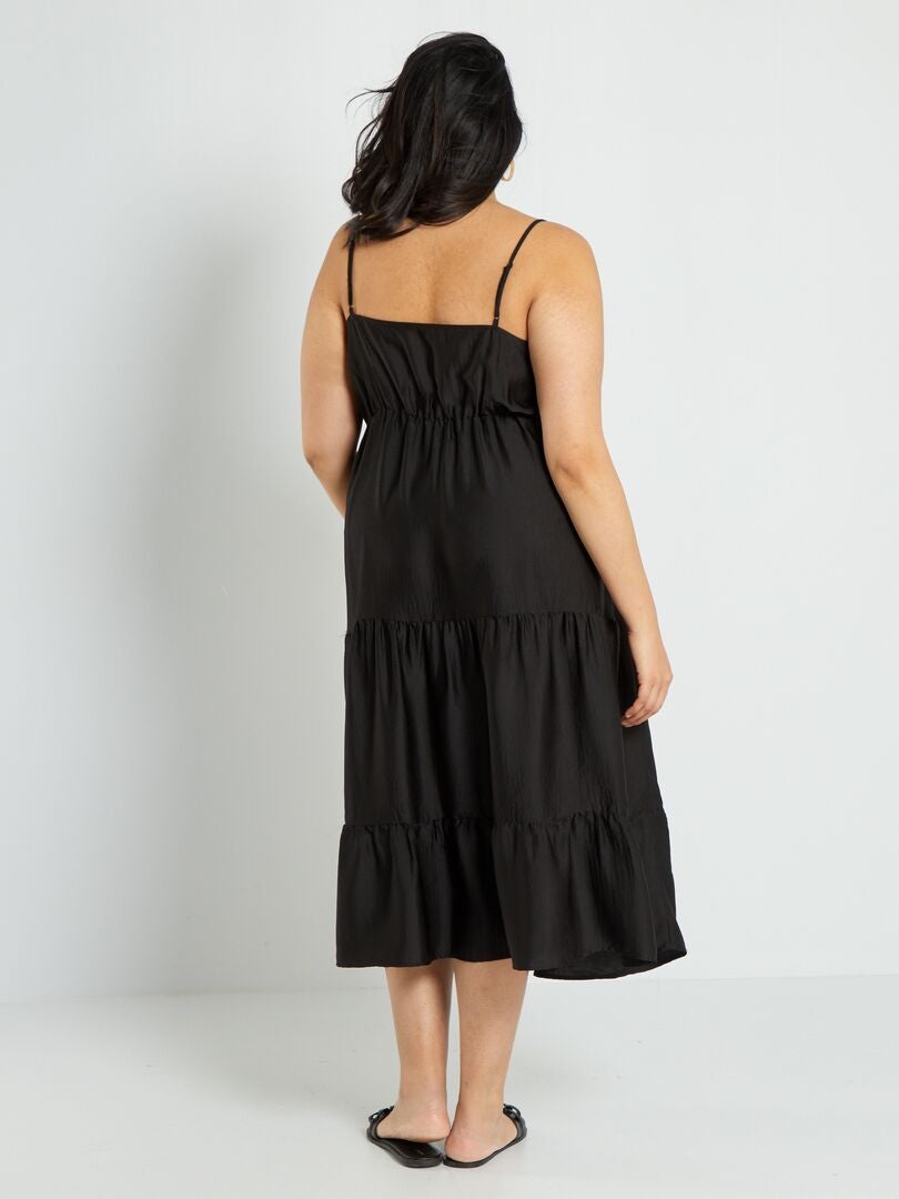 Lange jurk met satijnglans en strokenrok zwart - Kiabi