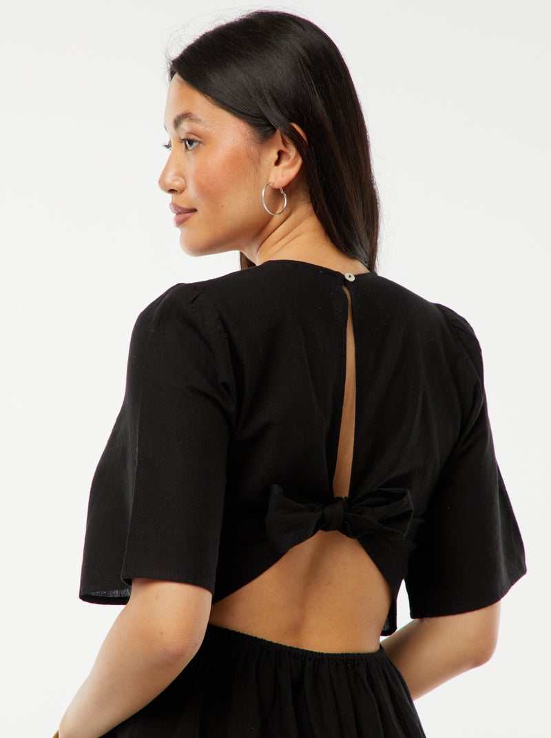 Lange jurk met volant aan de zoom en open achterkant zwart - Kiabi