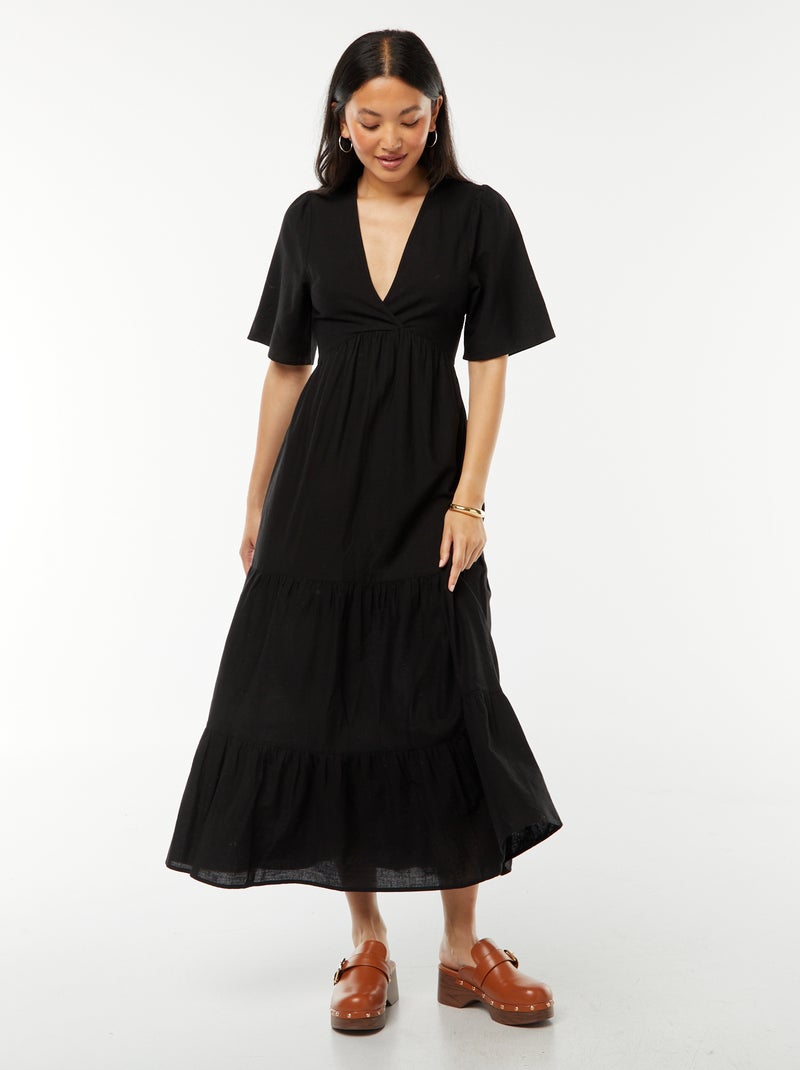 Lange jurk met volant aan de zoom en open achterkant zwart - Kiabi