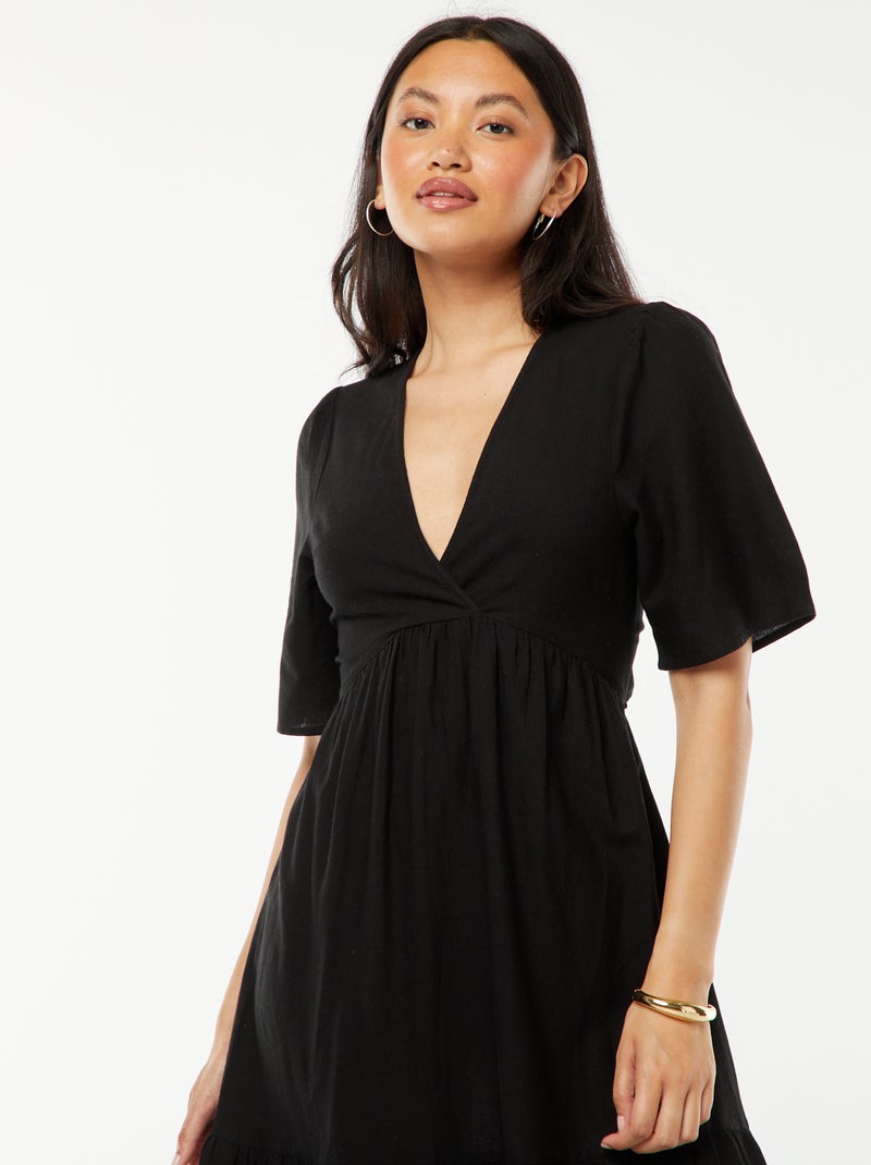 Lange jurk met volant aan de zoom en open achterkant zwart - Kiabi