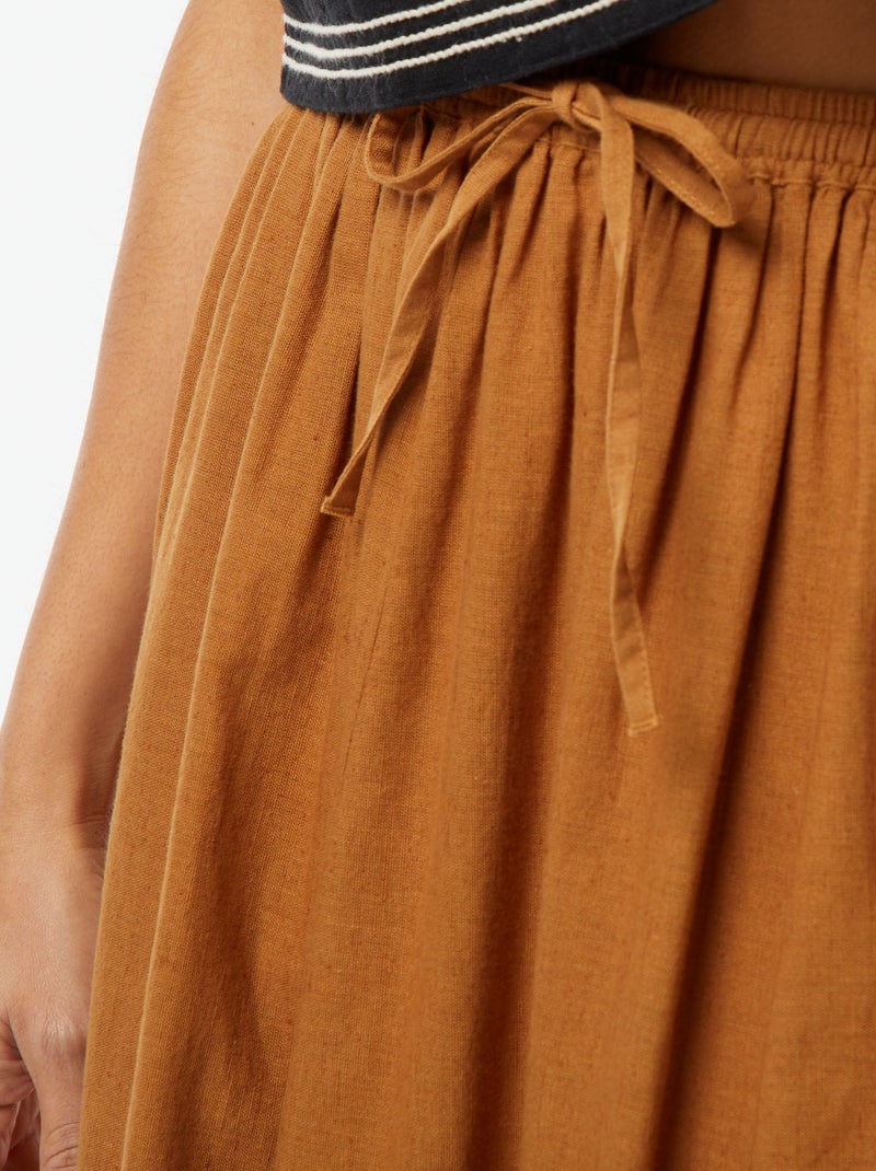 Lange rok met elastische tailleband en strikkoordje Bruin - Kiabi