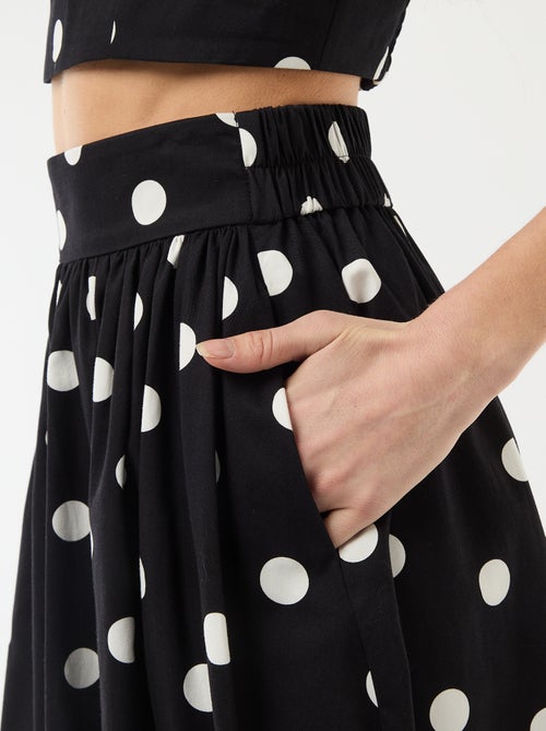 Midi rok met plooien en uitlopend model met stippenprint - Kiabi