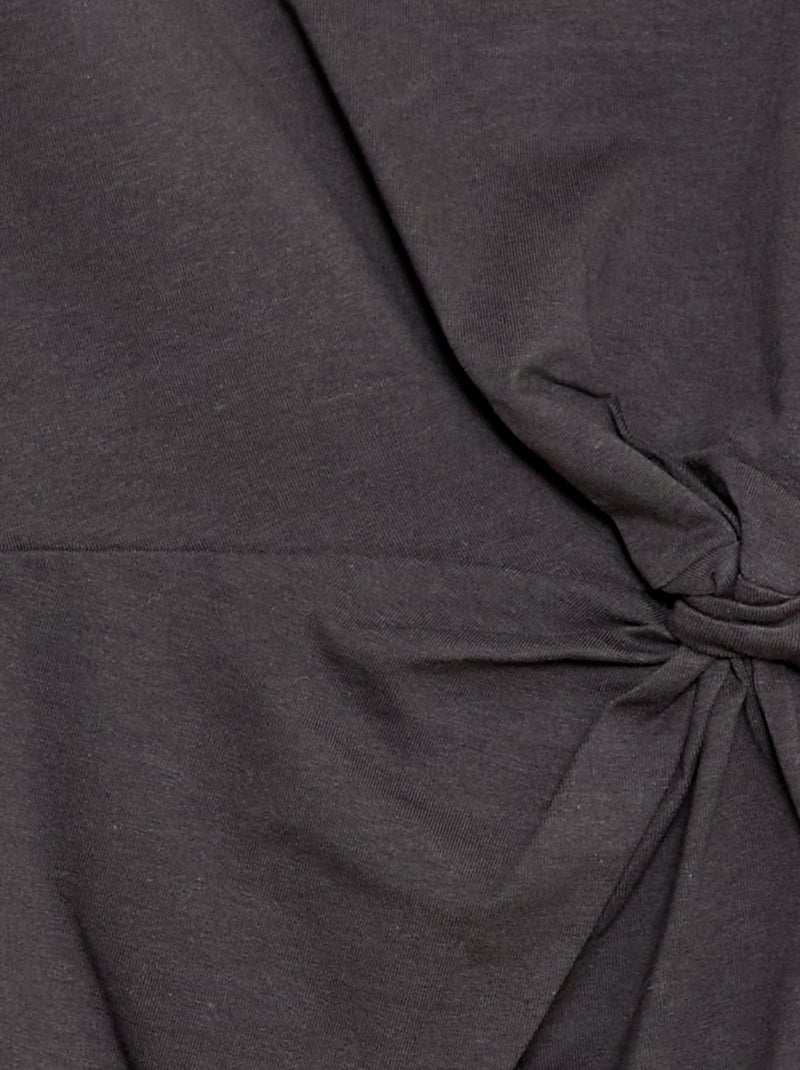 Midi T-shirtjurk met decoratieve knoop vooraan Zwart - Kiabi
