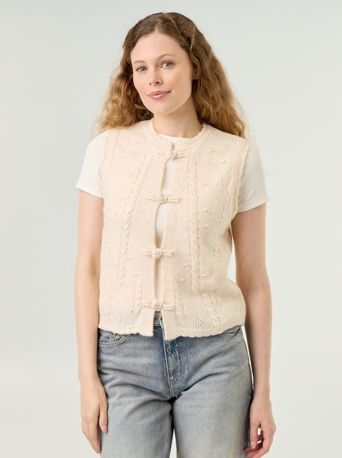Mouwloos gilet met golvende afwerkingen - Kiabi Mouwloos gilet met golvende afwerkingen - Kiabi