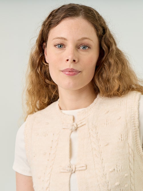 Mouwloos gilet met golvende afwerkingen - Kiabi Mouwloos gilet met golvende afwerkingen - Kiabi