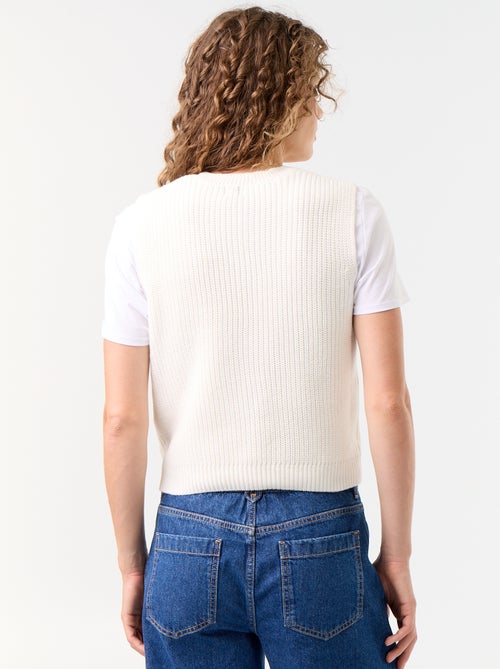 Mouwloos gilet met ronde hals van grof gebreid - Kiabi Mouwloos gilet met ronde hals van grof gebreid - Kiabi