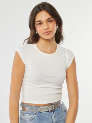 Mouwloos T-shirt met opengewerkt detail onderaan het rugpand