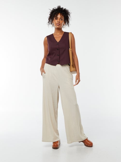 Mouwloos vestje met knopen - Kiabi