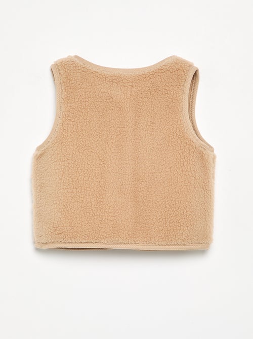 Mouwloze jas met schapenvachteffect - Kiabi Mouwloze jas met schapenvachteffect - Kiabi