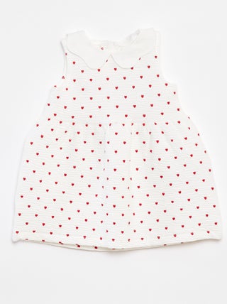 Mouwloze jurk van kreukeltricot met motiefje