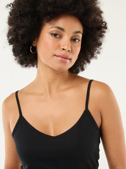 Mouwloze top met smalle bandjes - Kiabi Mouwloze top met smalle bandjes - Kiabi