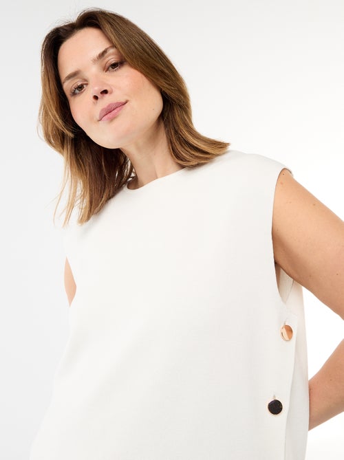 Mouwloze trui met goudkleurige knopen aan de zijkant - Kiabi