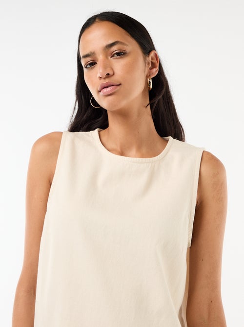 Mouwmloze denim jurk met uitlopende onderkant - Kiabi