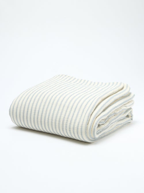 Omkeerbare katoenen mousseline deken met ribfluweel - Kiabi Home - Kiabi