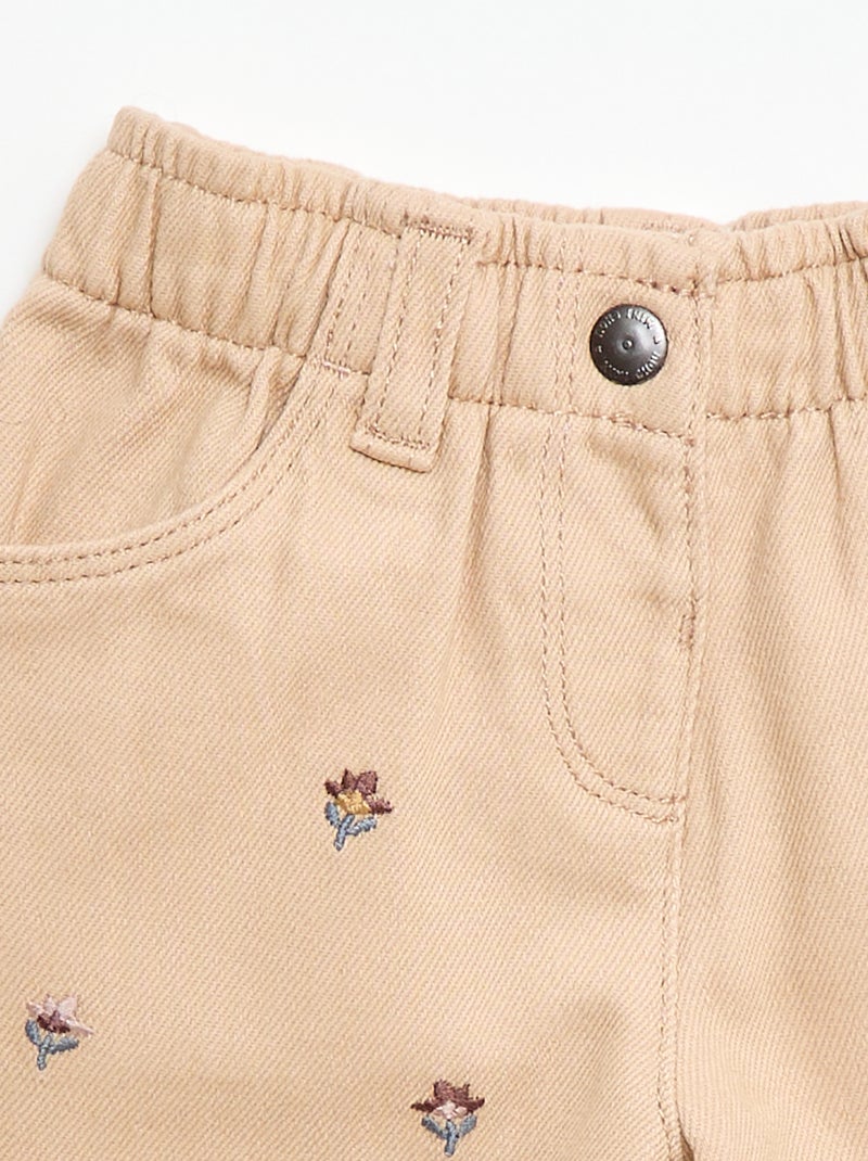 Paperbag broek met 'bloemen' borduursel Biege - Kiabi
