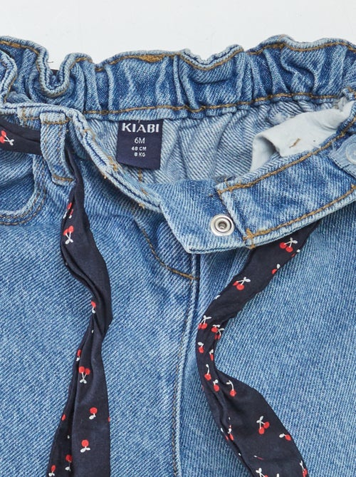 Paperbagjeans + riem met motiefje - Kiabi