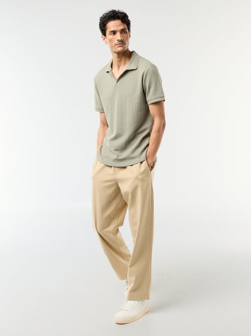 Polo met korte mouwen en gewafelde stof - Kiabi Polo met korte mouwen en gewafelde stof - Kiabi