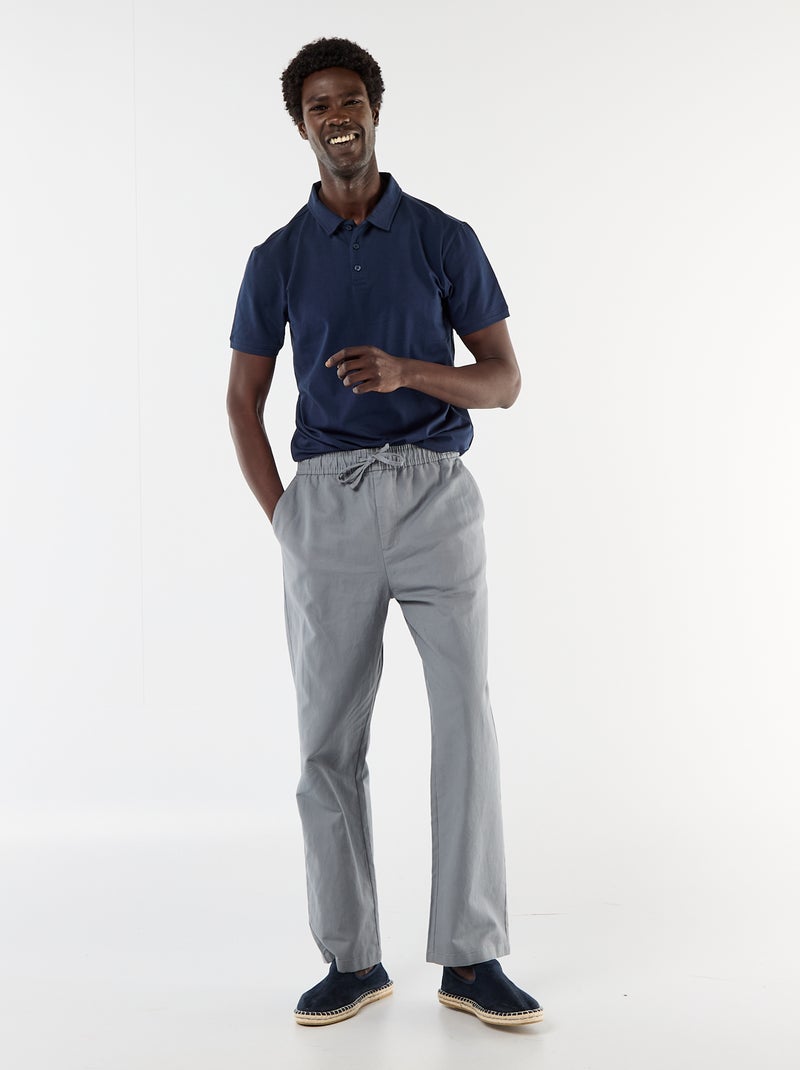 Polo van jerseytricot met knoopsluiting Zwart - Kiabi
