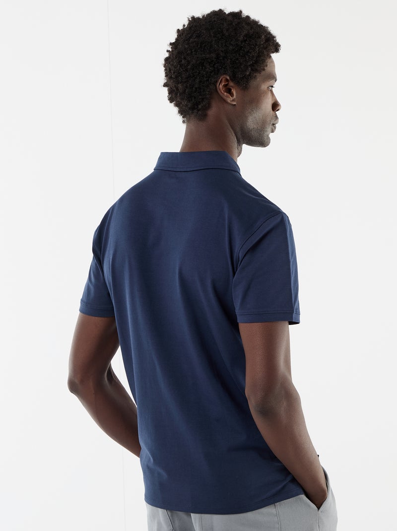 Polo van jerseytricot met knoopsluiting Zwart - Kiabi