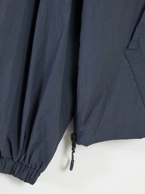 Regenjas met capuchon - collectie gemakkelijk aan te trekken - Kiabi