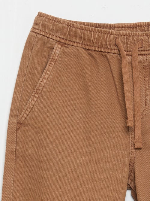 Relaxed fit-broek met elastische taille - Kiabi Relaxed fit-broek met elastische taille - Kiabi