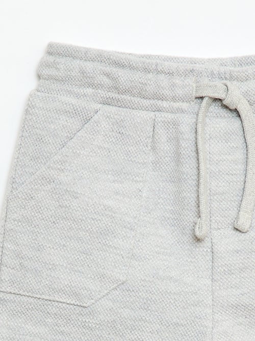 Relaxte broek van piqué breisel - Kiabi