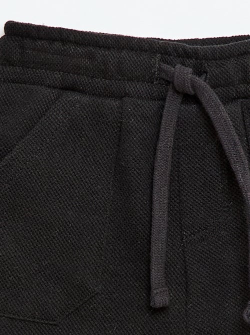 Relaxte broek van piqué breisel - Kiabi