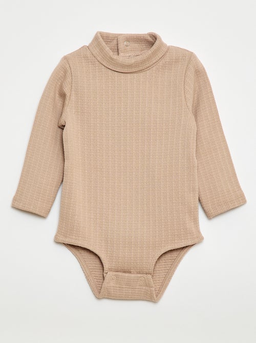 Rompertje met fijn ajourmotiefje en opstaande kraag - Kiabi