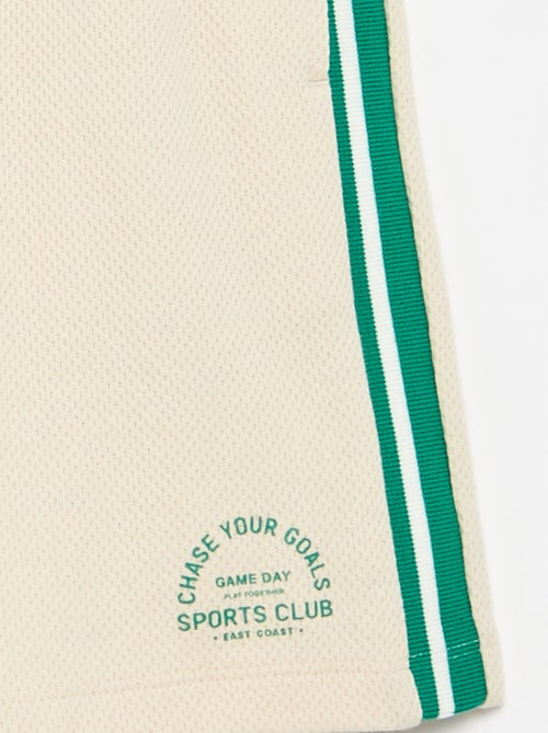 Ruime short met contrasterende strepen aan de zijkanten - Kiabi