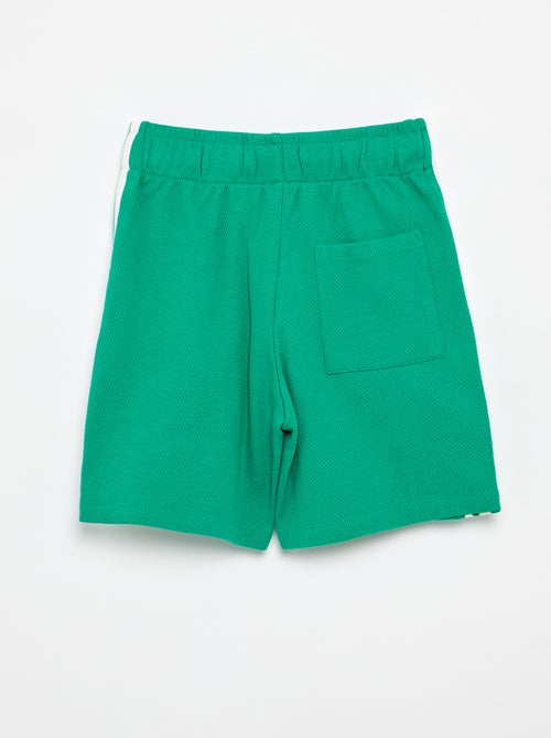 Ruime short met contrasterende strepen aan de zijkanten - Kiabi