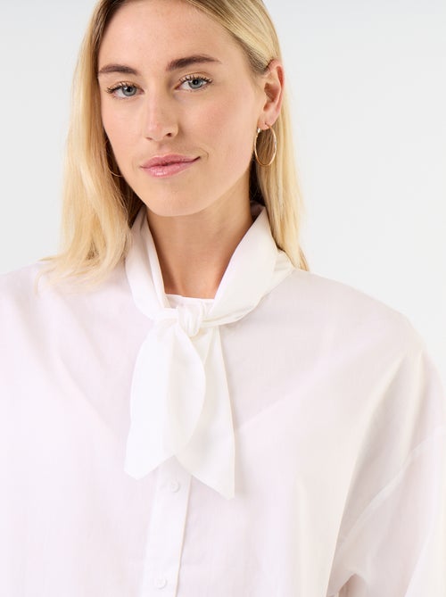 Ruimvallende blouse met lange mouwen en lavallièrekraag - Kiabi