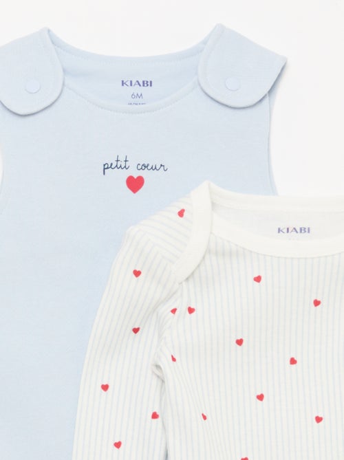 Set met body met lange mouwen + tuinbroek met voetjes - Kiabi Set met body met lange mouwen + tuinbroek met voetjes - Kiabi