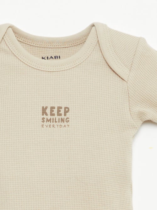 Set rekbare meegroei-body + pyjama van ribtricot - Kiabi