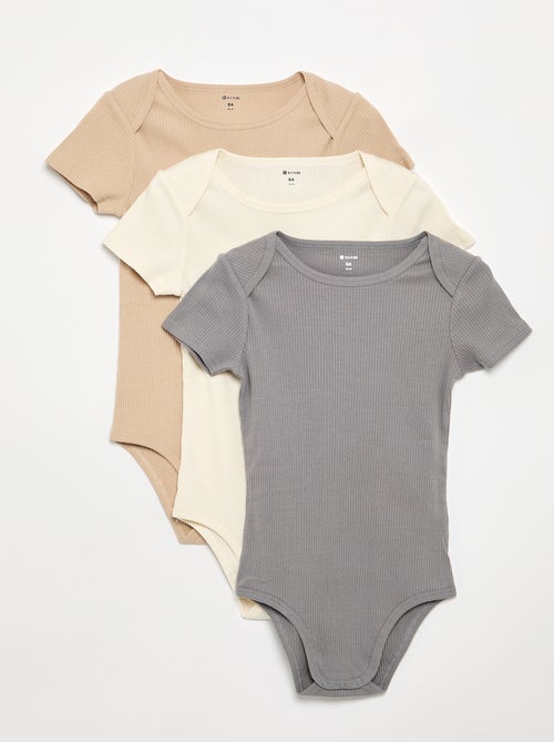 Set van 3 ribstoffen bodies - gemakkelijk aan te trekken collectie - Kiabi Set van 3 ribstoffen bodies - gemakkelijk aan te trekken collectie - Kiabi