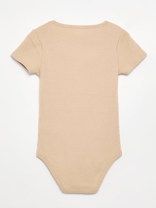 Set van 3 ribstoffen bodies - gemakkelijk aan te trekken collectie - Kiabi Set van 3 ribstoffen bodies - gemakkelijk aan te trekken collectie - Kiabi