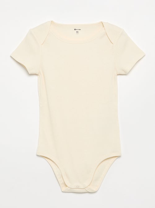 Set van 3 ribstoffen bodies - gemakkelijk aan te trekken collectie - Kiabi Set van 3 ribstoffen bodies - gemakkelijk aan te trekken collectie - Kiabi