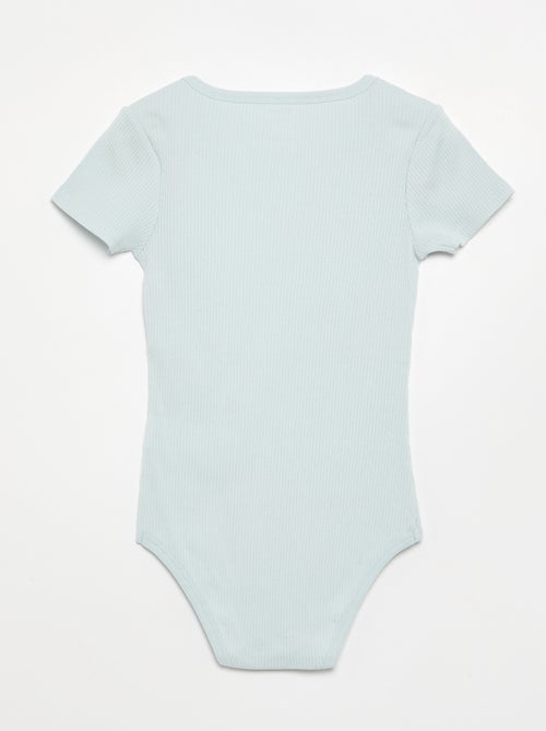 Set van 3 ribstoffen bodies - gemakkelijk aan te trekken collectie - Kiabi Set van 3 ribstoffen bodies - gemakkelijk aan te trekken collectie - Kiabi