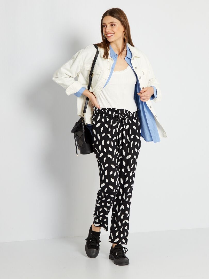 Soepelvallende broek met print ZWART - Kiabi