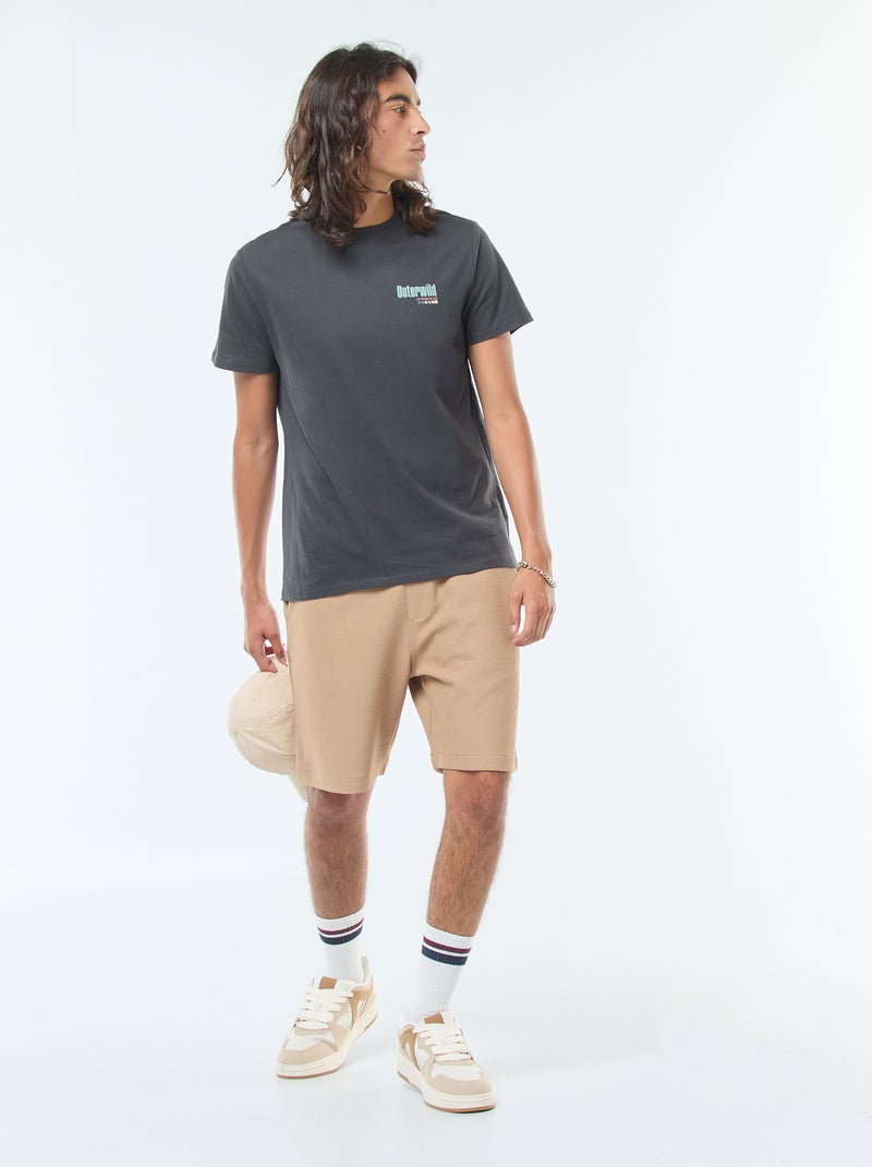 Sportshort met zakken en fantasiepatroontje Biege - Kiabi